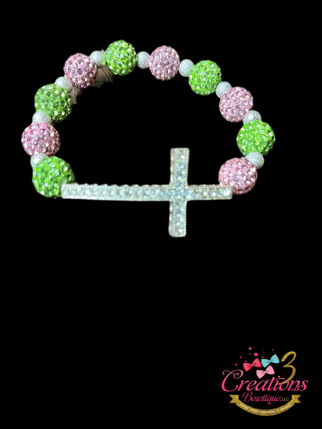 Big pink/green cross bracelet