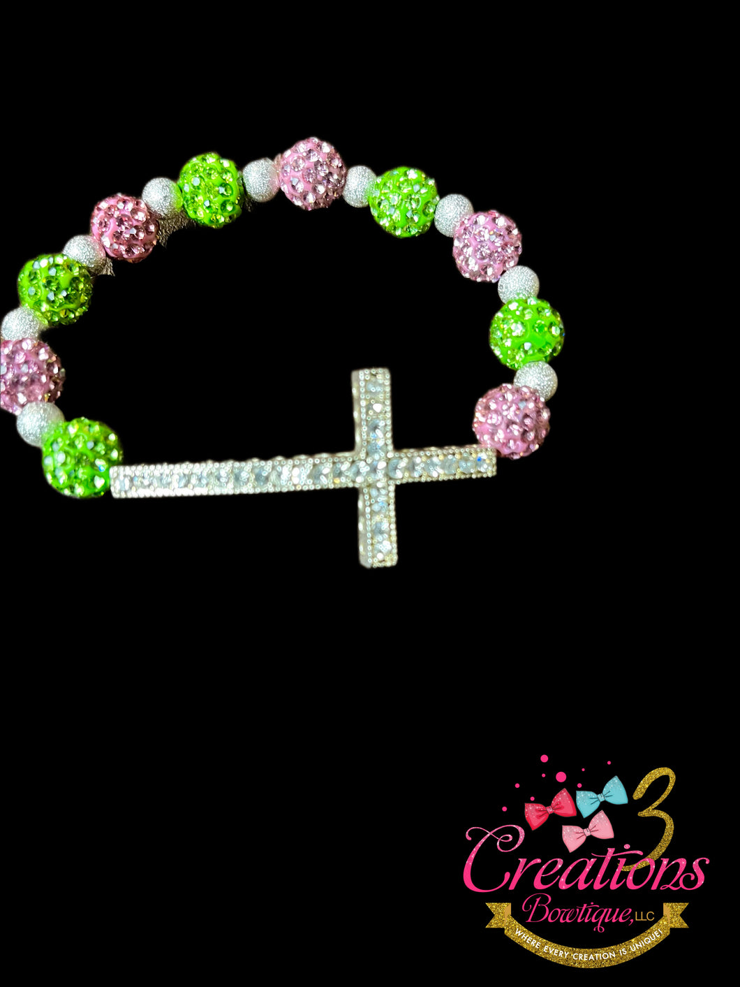 Pink/ green cross bracelet