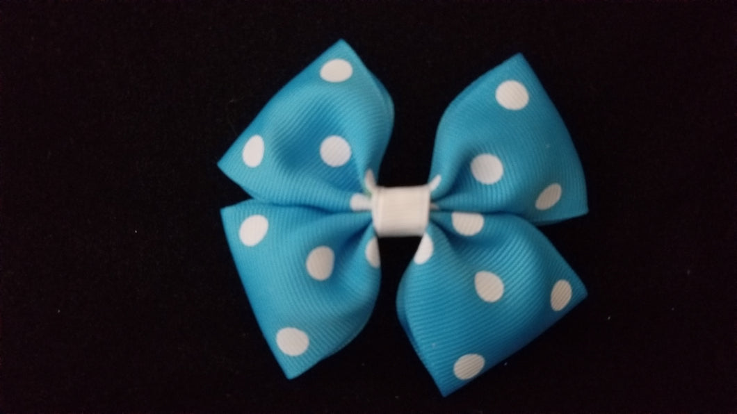 Turquoise polka dot bow