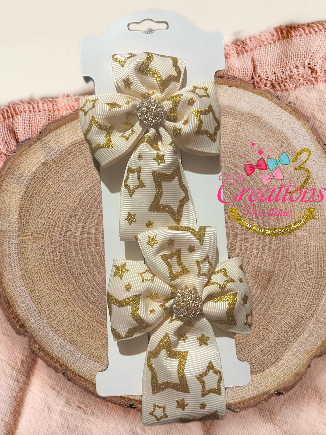 Cream and gold glitter star cross