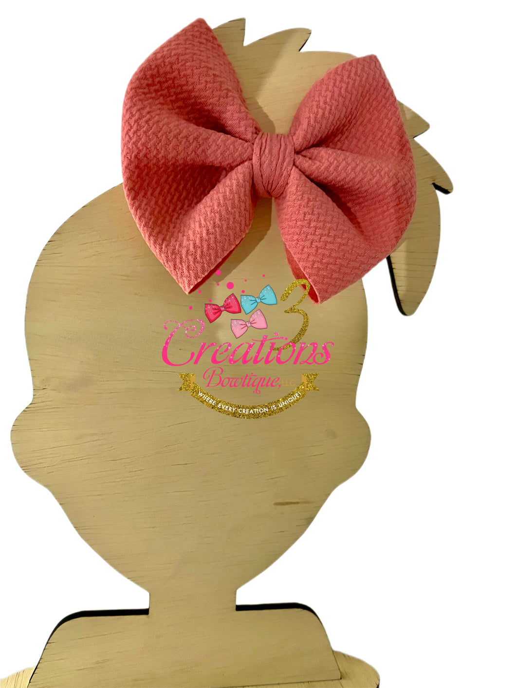 Coral pink hair bow